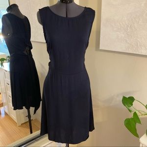 NWOT Navy sleeveless cross back dress.